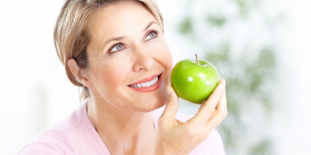 Woman with apples